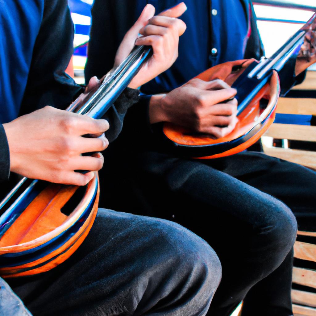 Person playing musical instruments together